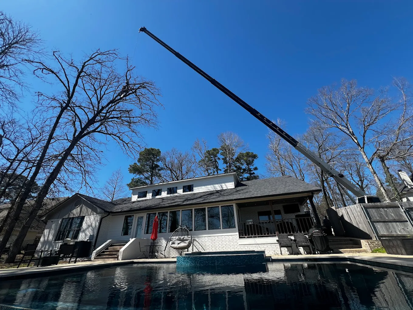 Professional tree removal crew at work in Shreveport residential neighborhood—tree removal Shreveport, safe and efficient, professional team, chainsaw operation, high realism
